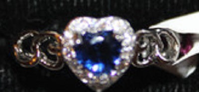 W00309 Silvertone Ring with Heart Shaped Dk Blue Stone with Accent Clear Faux Crystals Size 8