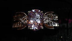 W00314 Silvertone Ring With Purple stone with  Clear Crystals on band Size 8