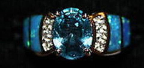 W00301 Silvertone Ring with Blue, Clear and Abalone Faux Stones Size 8