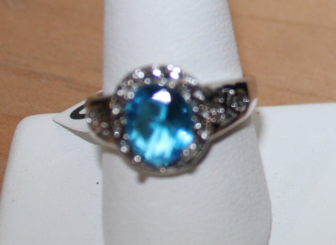 Elegant Silvertone Ring with Large Oval Faux Light Blue Crystal Size 9