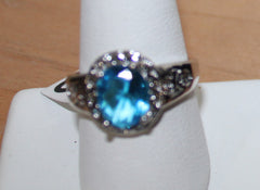 Elegant Silvertone Ring with Large Oval Faux Light Blue Crystal Size 9