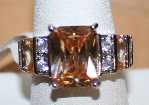 Silvertone Ring with Peach Crystal Size 7