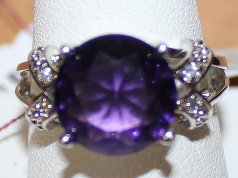 W00370 Silvertone Ring with Purple and Clear Crystals Size 10
