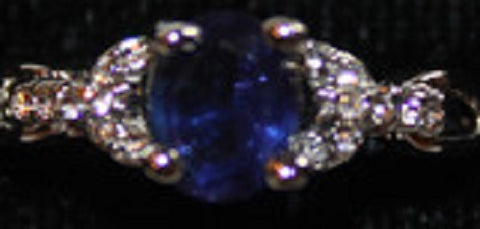 W00308 Silvertone Ring with Dk Blue Stone with Accent Clear Faux Crystals Size 8
