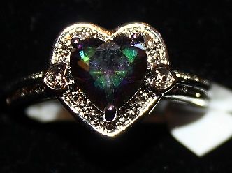 W00361 Silvertone Ring with Rainbow Crystal Heart and Clear Crystals Size 9